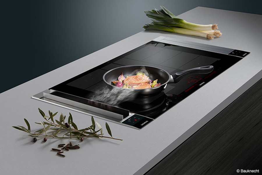 Kochfeld von BORA mit integriertem, innovativem Dunstabzug bei woodendesign Küchen