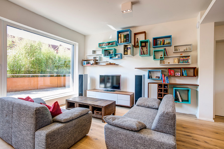 Wohnzimmer Möbel aus Holz Wohnzimmertisch Schrankwand Regalwand Raumtrenner nach Maß aus Massivholz Möbeltischlerei woodendesign Möbeltischler Möbelmanufaktur Hamburg